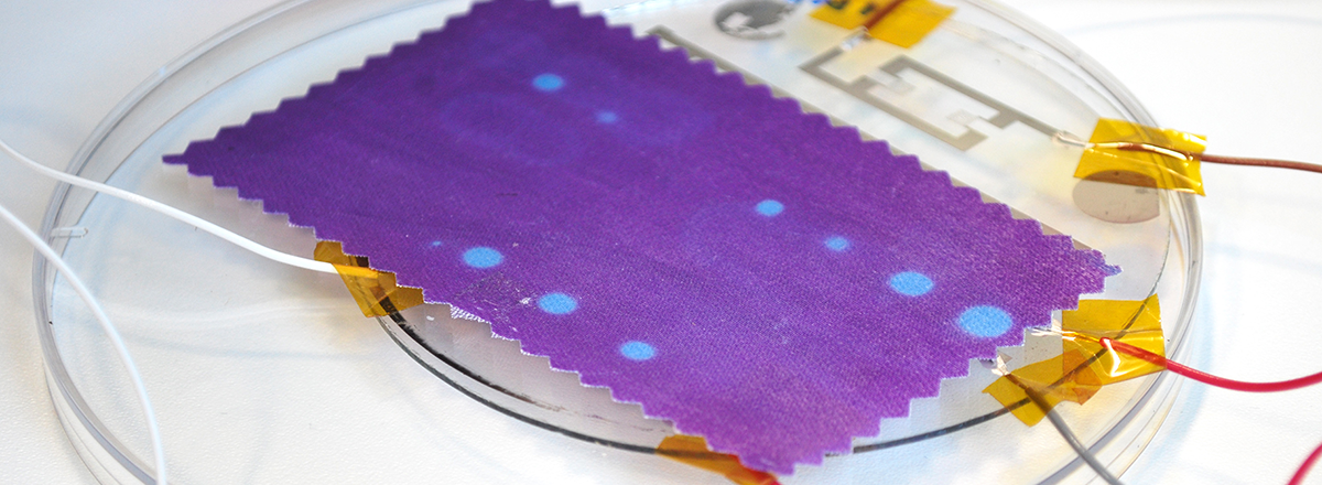 Thermochromicly (heat sensitive) printed textile. The textile is activated with circuits of microheaters, which are electroplated onto a glass wafer.